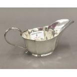 A silver sauce boat (3.