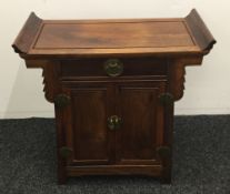 A small Chinese hardwood side cabinet