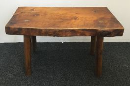 A rustic plank top table