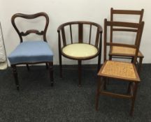 An Edwardian inlaid mahogany tub chair and three other chairs