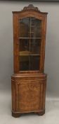 A modern walnut glazed corner cabinet and a mahogany sofa table