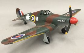 A tin plated model of a hurricane plane