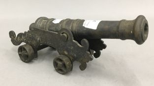 A bronze model cannon