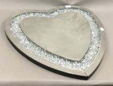 A heart shaped mirror