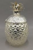 A silver plated pineapple ice bucket