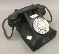 A black bakelite telephone