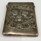 A Victorian embossed silver card case