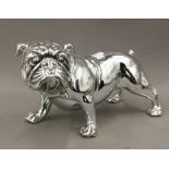 A silver coloured model of a bulldog