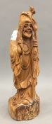 A Chinese carved wooden figure of Shao Lao