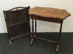 An early 20th century oak folding cake stand and a side table