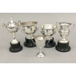 Five small silver trophy cups (4.