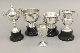 Five small silver trophy cups (4.