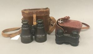 A pair of Dollond & Co field glasses and another pair