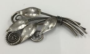 An Art Nouveau silver brooch