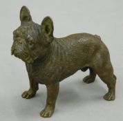 A bronze model of a French Bulldog. 7 cm high, 7.5 cm long.