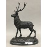 A bronze model of a stag