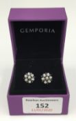 A pair of 9 ct white gold diamond and sapphire earrings