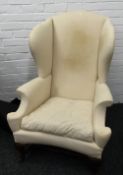 A Victorian wing back armchair