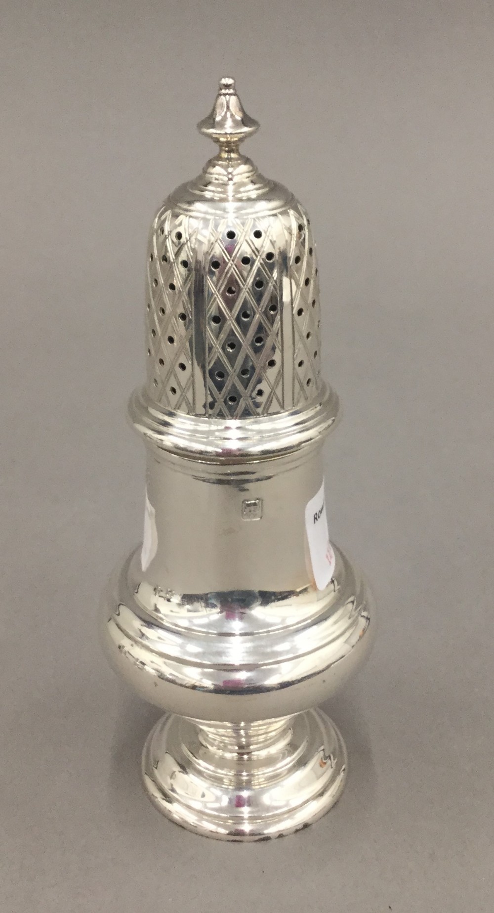 A silver sugar castor (4.