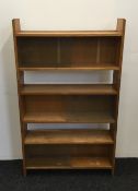 A 20th century oak stacking bookcase