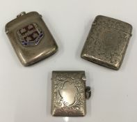 Three silver vesta cases