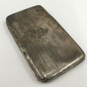 A silver cigarette case (6.