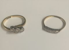 Two 18 ct gold and platinum diamond set rings (4.