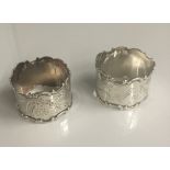 A pair of silver napkin rings (45.