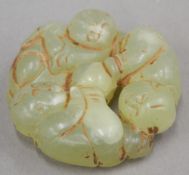 A jade roundel carved with three boys