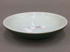 A Chinese shallow green porcelain dish