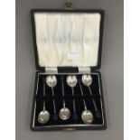 A cased set of silver coffee bean spoons (37.