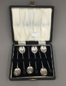 A cased set of silver coffee bean spoons (37.