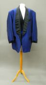 A dark blue dinner jacket - WITHDRAWN With black facings and covered buttons;