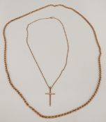 A 9 K gold necklace and a 9 ct gold cross on chain (13.