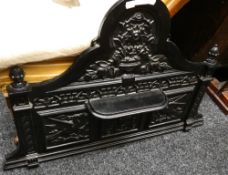 A cast iron washstand back