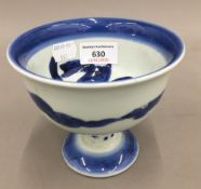 A Chinese blue and white porcelain stem cup