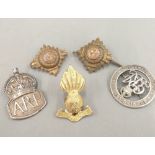 Two silver military badges, etc.