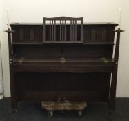 A Bechstein oak Arts & Crafts Medieval revival upright piano (serial number 51824)