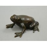 A Japanese bronze model of a frog