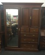 A Victorian compactum wardrobe. 207 cm high, 160 cm wide, 56 cm deep.