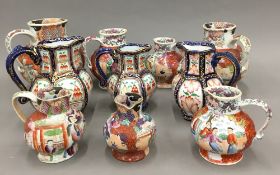 A collection of Masons Ironstone jugs