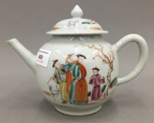 An 18th century Chinese porcelain teapot. 16 cm high.