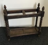 A Victorian carved oak stick stand