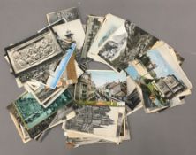 A box of foreign vintage postcards