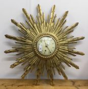 A gilt sun burst clock