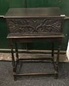 An 18th century and later oak Bible box on stand