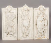 Three 19th century painted plaster relief plaques, one formed as a turtle,