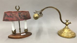 A brass desk lamp,