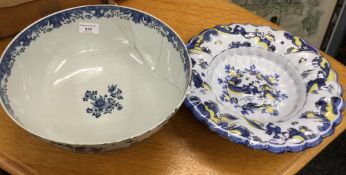 An 18th century Chinese punch bowl and a Delft dish