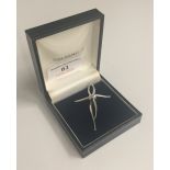 An 18 ct white gold diamond cross pendant (7 grammes total weight)